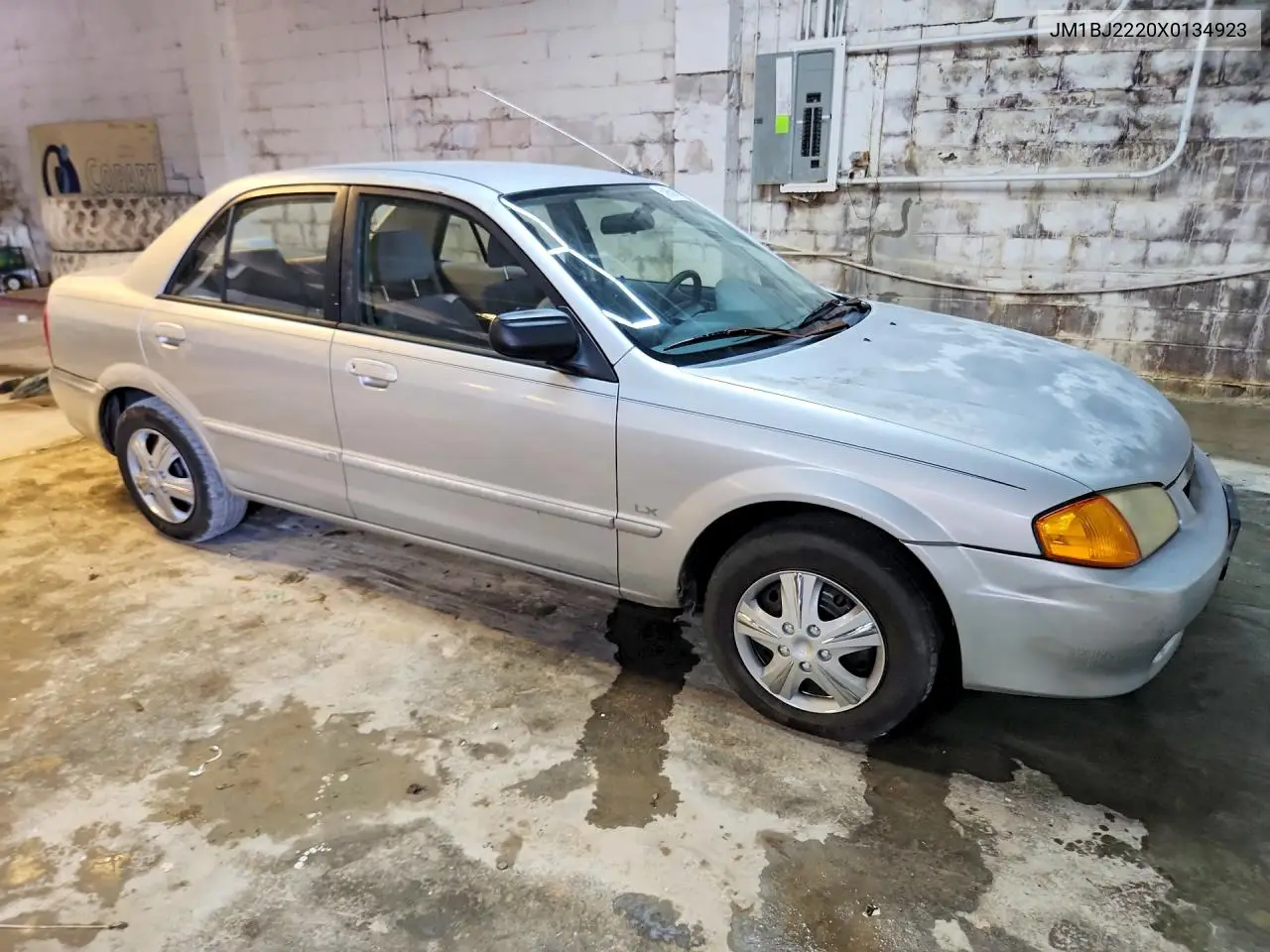1999 Mazda Protege Lx VIN: JM1BJ2220X0134923 Lot: 59659166