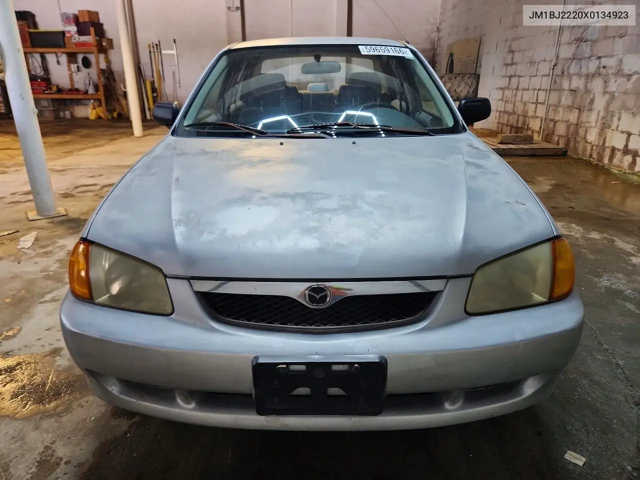 1999 Mazda Protege Lx VIN: JM1BJ2220X0134923 Lot: 59659166