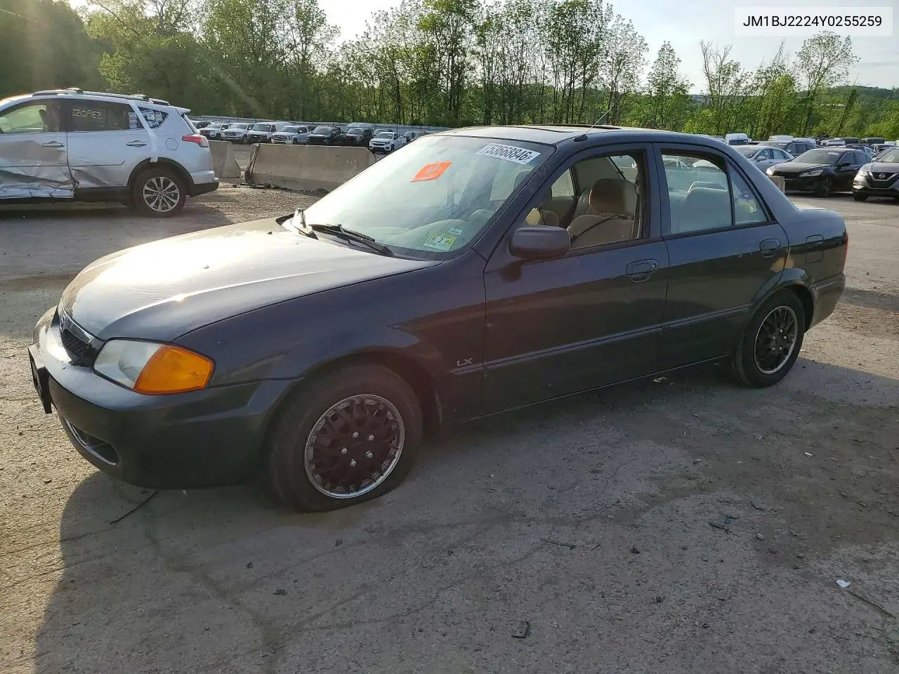 2000 Mazda Protege Dx VIN: JM1BJ2224Y0255259 Lot: 53668846