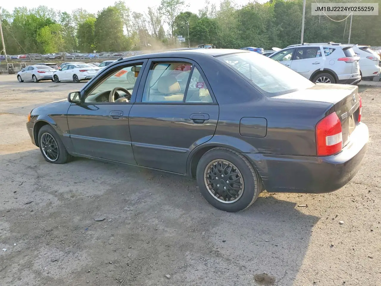 2000 Mazda Protege Dx VIN: JM1BJ2224Y0255259 Lot: 53668846