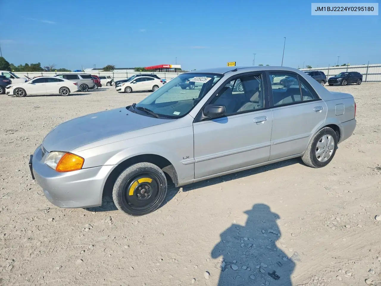 2000 Mazda Protege Dx VIN: JM1BJ2224Y0295180 Lot: 60089226