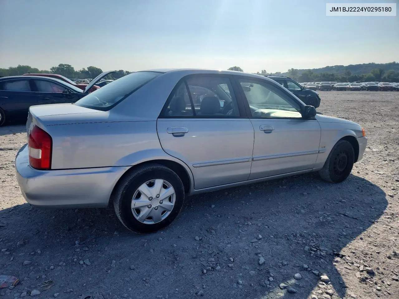 2000 Mazda Protege Dx VIN: JM1BJ2224Y0295180 Lot: 60089226