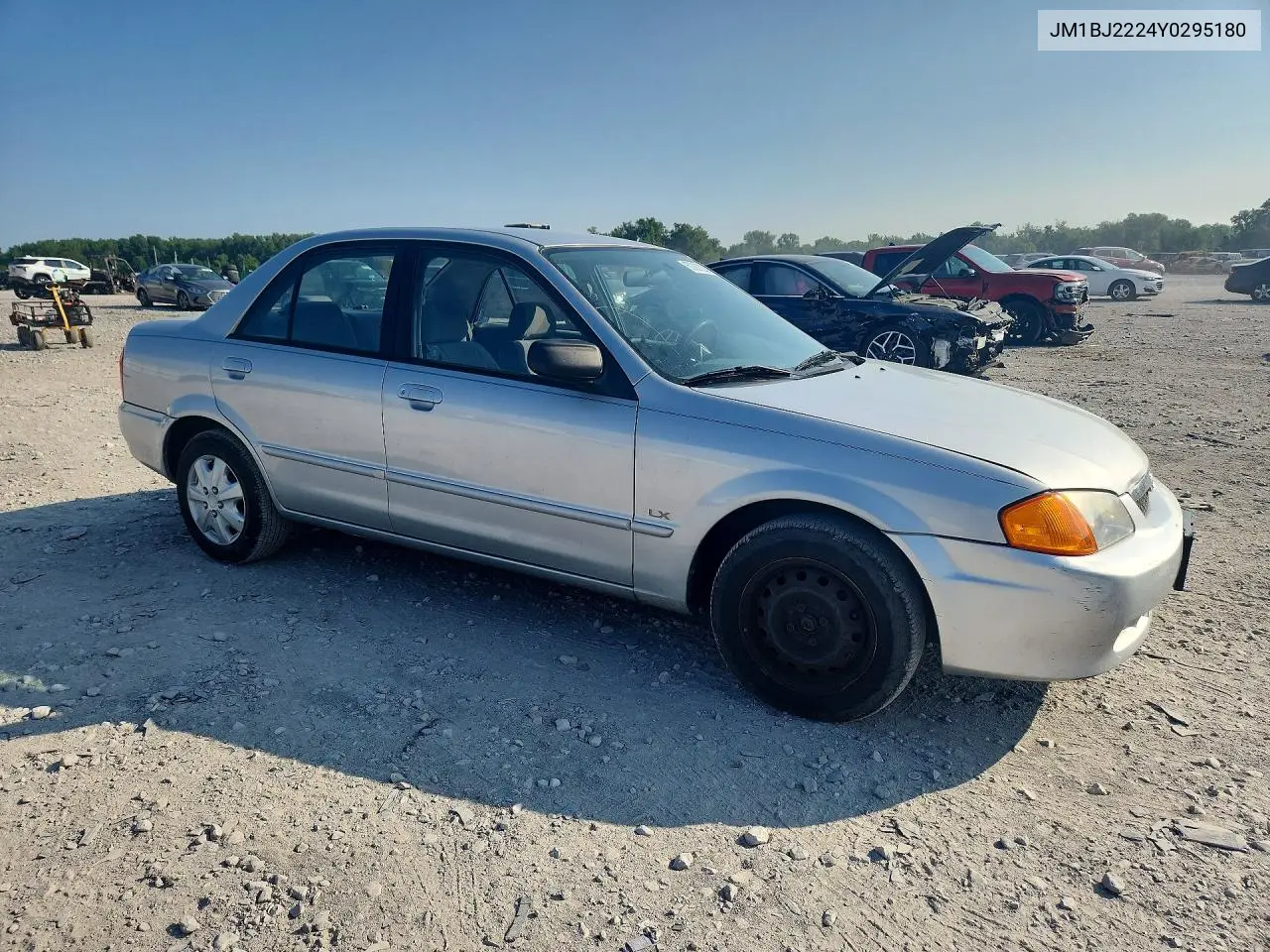 2000 Mazda Protege Dx VIN: JM1BJ2224Y0295180 Lot: 60089226
