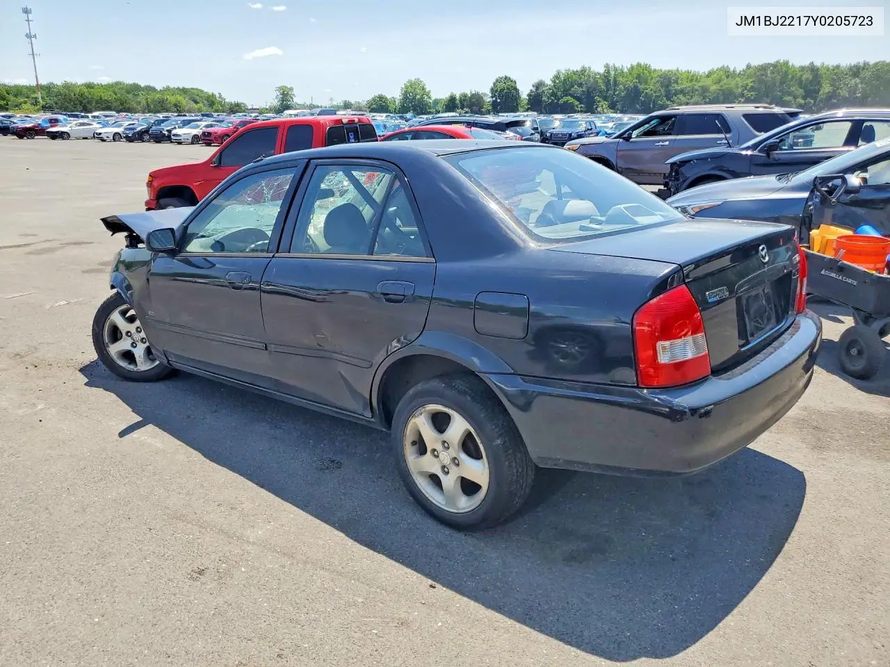 2000 Mazda Protege Es VIN: JM1BJ2217Y0205723 Lot: 62230396