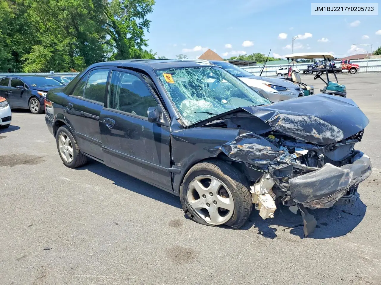 2000 Mazda Protege Es VIN: JM1BJ2217Y0205723 Lot: 62230396