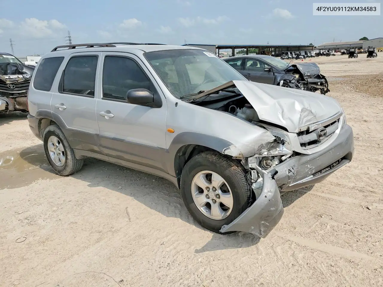 2002 Mazda Tribute Lx VIN: 4F2YU09112KM34583 Lot: 58616896