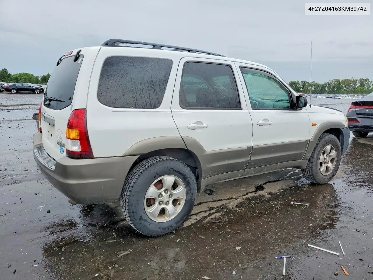 2003 Mazda Tribute Lx VIN: 4F2YZ04163KM39742 Lot: 52462396