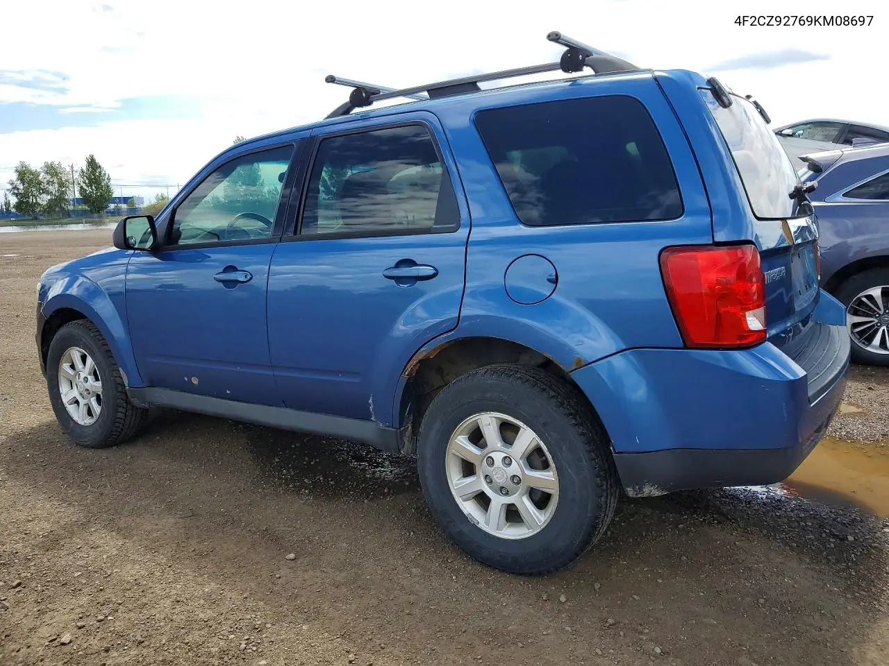 2009 Mazda Tribute I VIN: 4F2CZ92769KM08697 Lot: 58074146