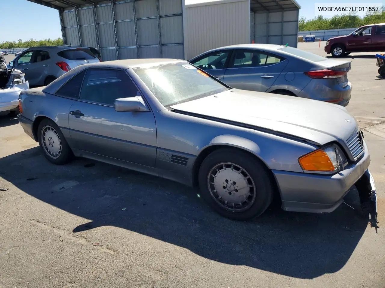 1990 Mercedes-Benz 500 Sl VIN: WDBFA66E7LF011557 Lot: 60511126
