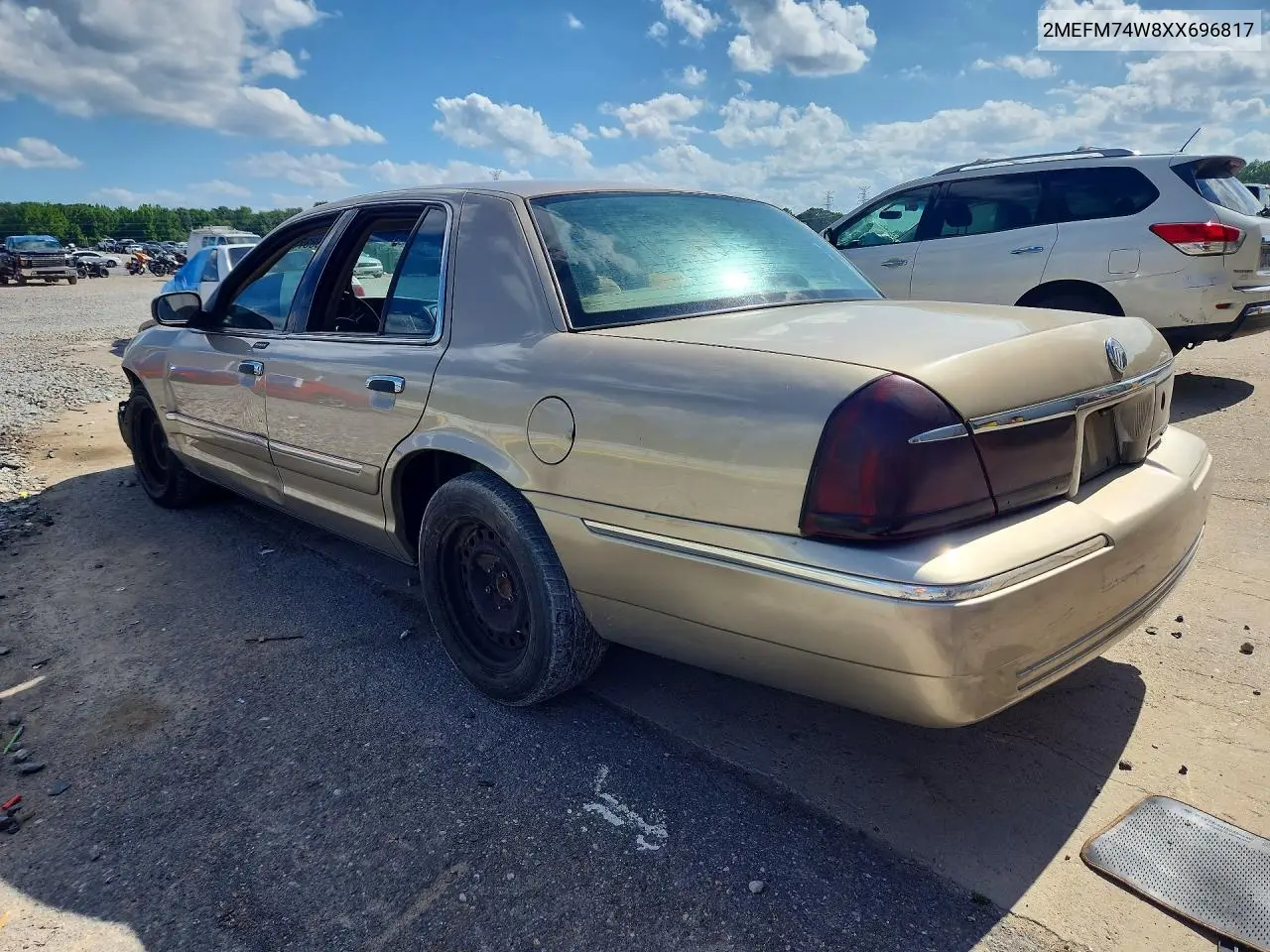 1999 Mercury Grand Marquis Gs VIN: 2MEFM74W8XX696817 Lot: 56837396