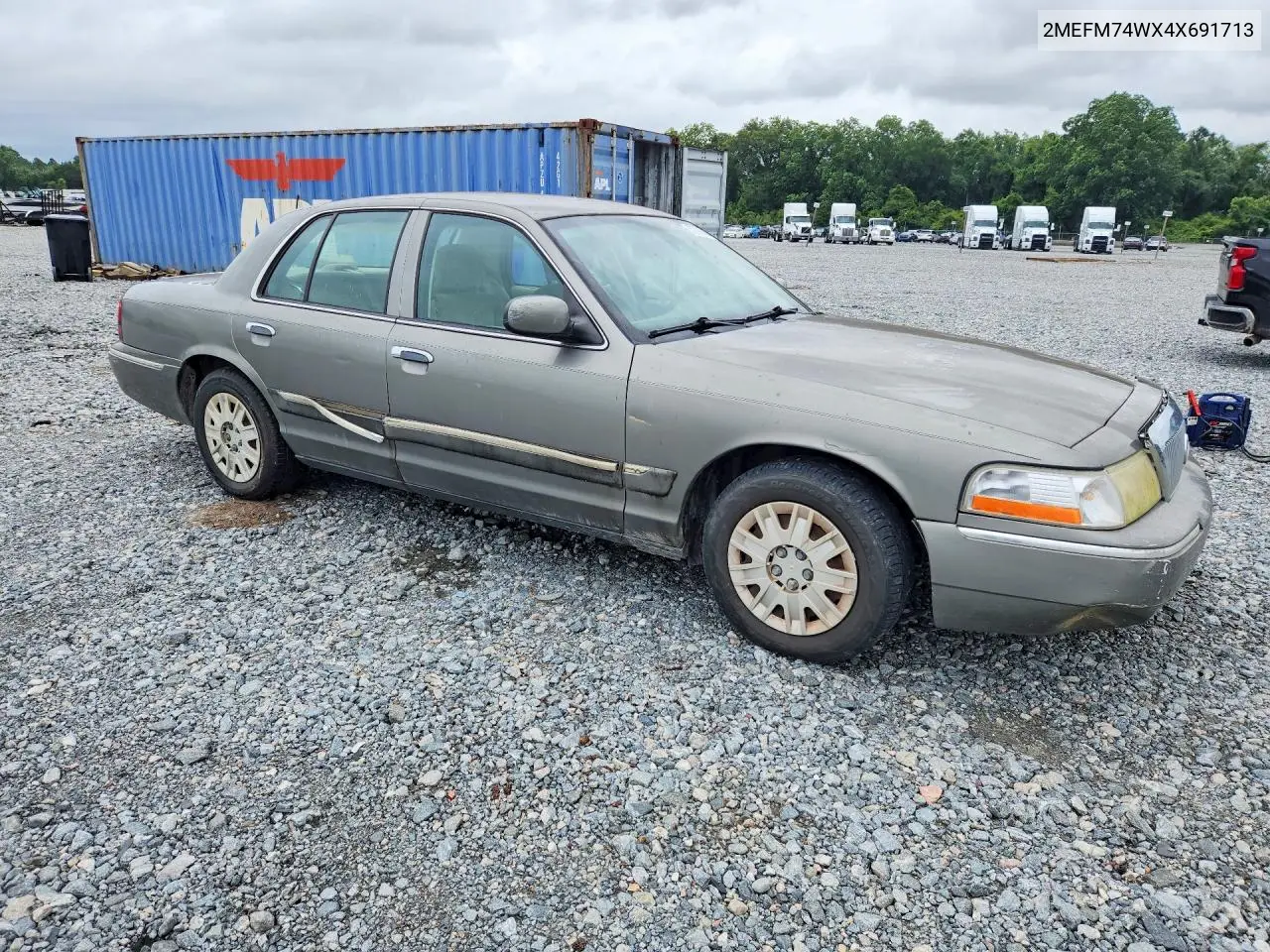 2004 Mercury Grand Marquis Gs VIN: 2MEFM74WX4X691713 Lot: 57721616