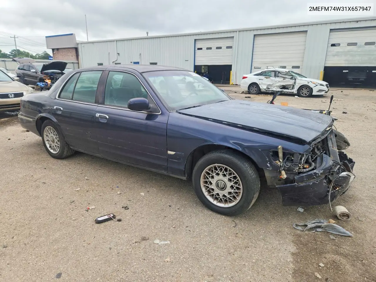 2001 Mercury Grand Marquis Gs VIN: 2MEFM74W31X657947 Lot: 60231916