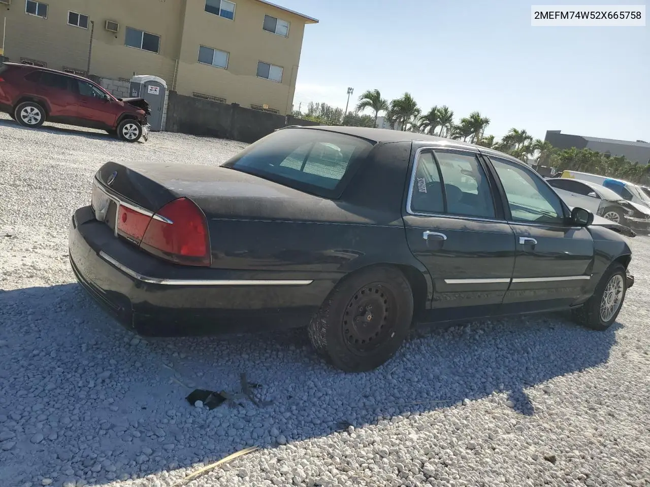 2002 Mercury Grand Marquis Gs VIN: 2MEFM74W52X665758 Lot: 48783515