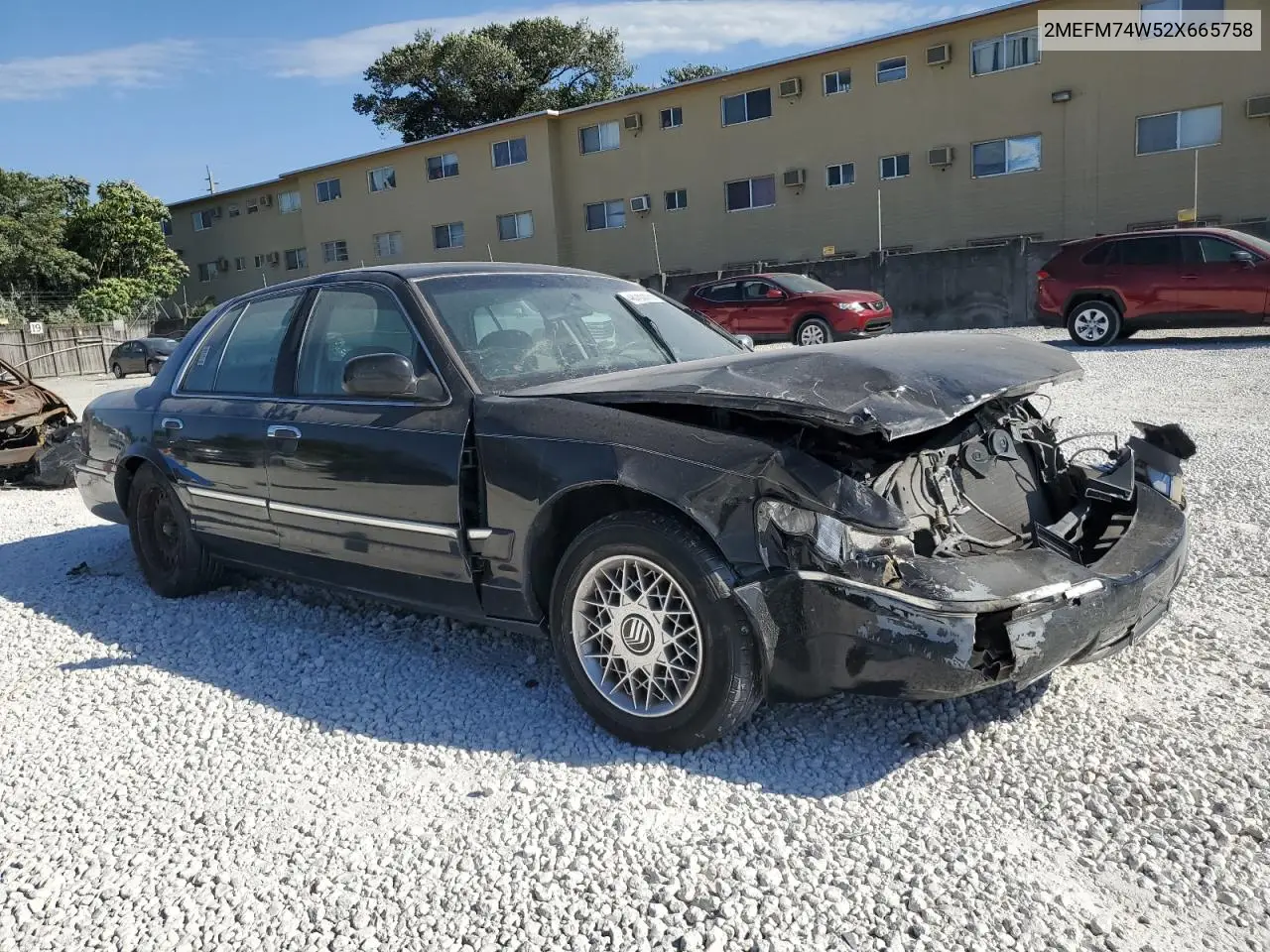 2002 Mercury Grand Marquis Gs VIN: 2MEFM74W52X665758 Lot: 48783515