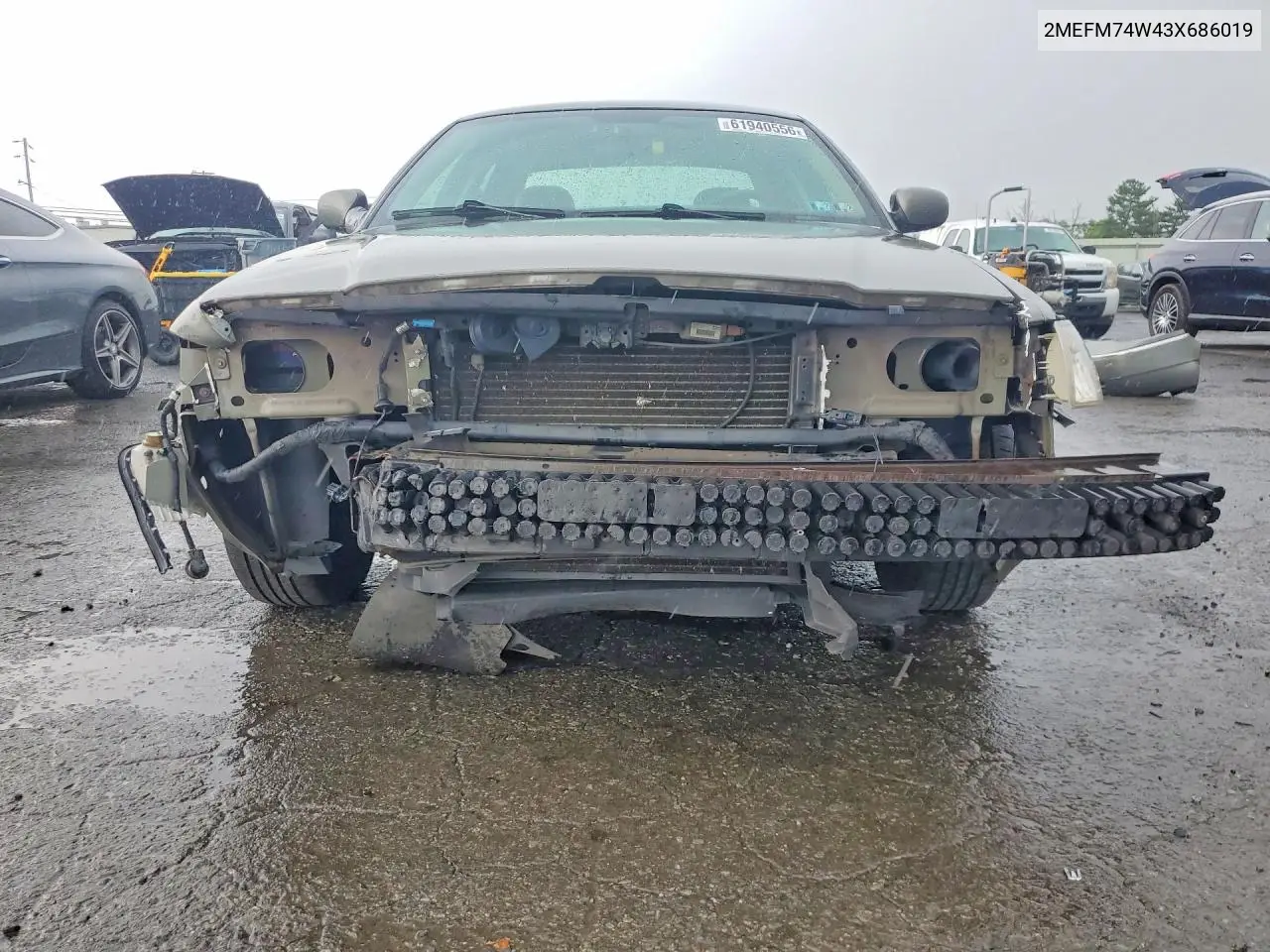 2003 Mercury Grand Marquis Gs VIN: 2MEFM74W43X686019 Lot: 61940556