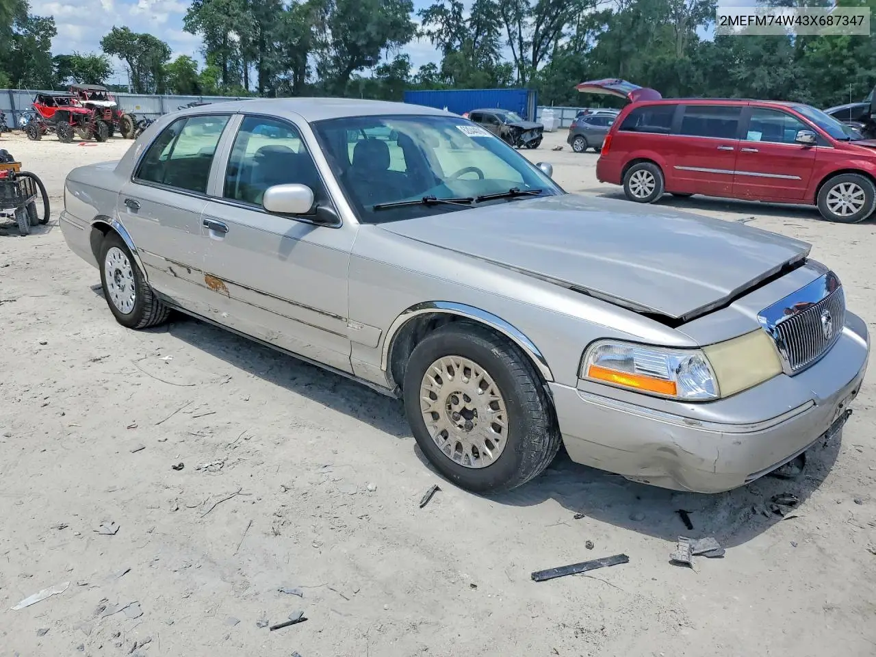 2003 Mercury Grand Marquis Gs VIN: 2MEFM74W43X687347 Lot: 62044016