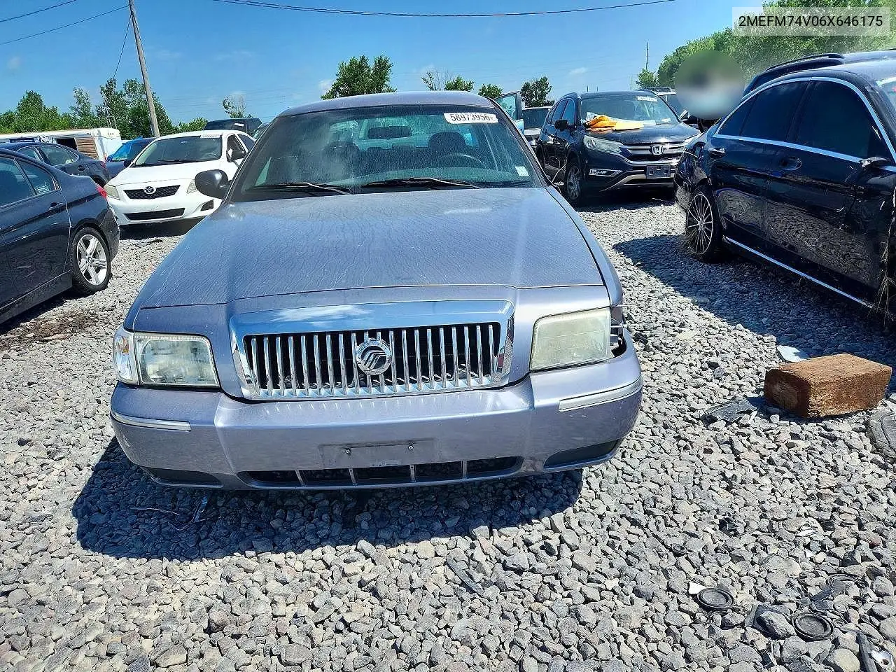 2006 Mercury Grand Marquis Gs VIN: 2MEFM74V06X646175 Lot: 58973956