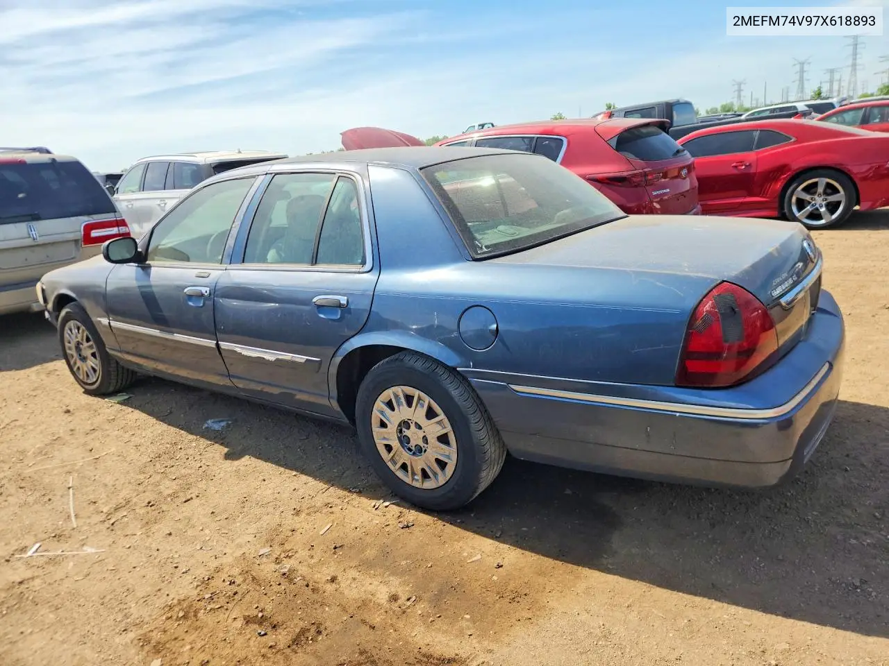 2007 Mercury Grand Marquis Gs VIN: 2MEFM74V97X618893 Lot: 55924276