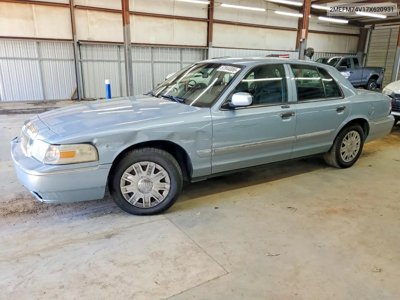 2007 Mercury Grand Marquis Gs VIN: 2MEFM74V17X620931 Lot: 57844886