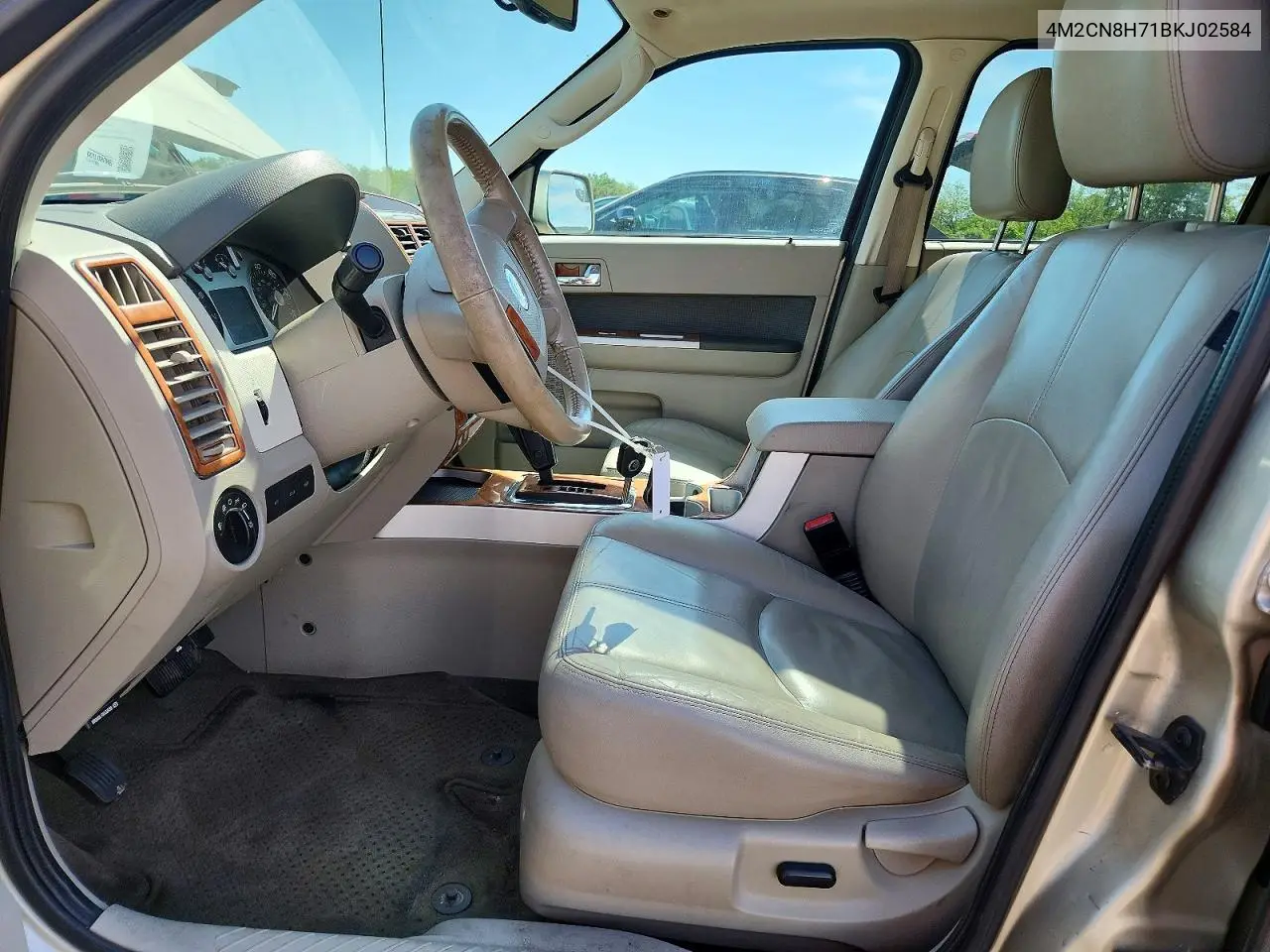 2011 Mercury Mariner Premier VIN: 4M2CN8H71BKJ02584 Lot: 55214026