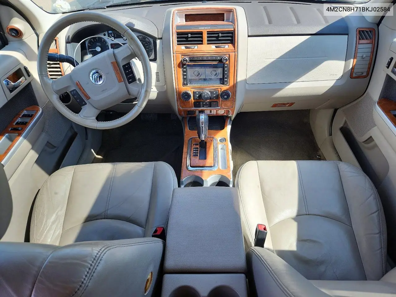 2011 Mercury Mariner Premier VIN: 4M2CN8H71BKJ02584 Lot: 55214026