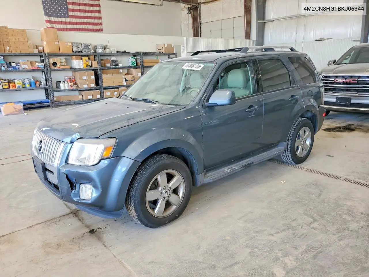 2011 Mercury Mariner Premier VIN: 4M2CN8HG1BKJ06344 Lot: 60386186