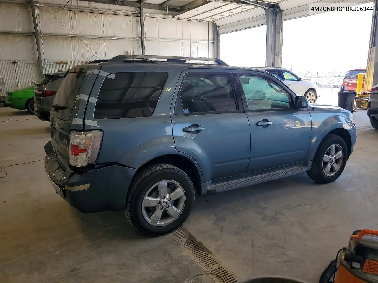 2011 Mercury Mariner Premier VIN: 4M2CN8HG1BKJ06344 Lot: 60386186