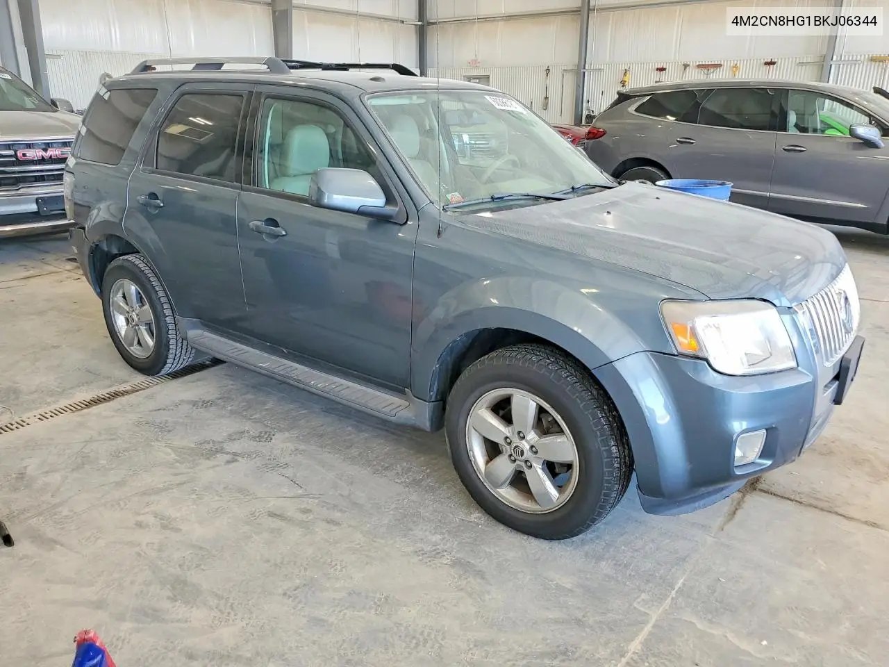 2011 Mercury Mariner Premier VIN: 4M2CN8HG1BKJ06344 Lot: 60386186
