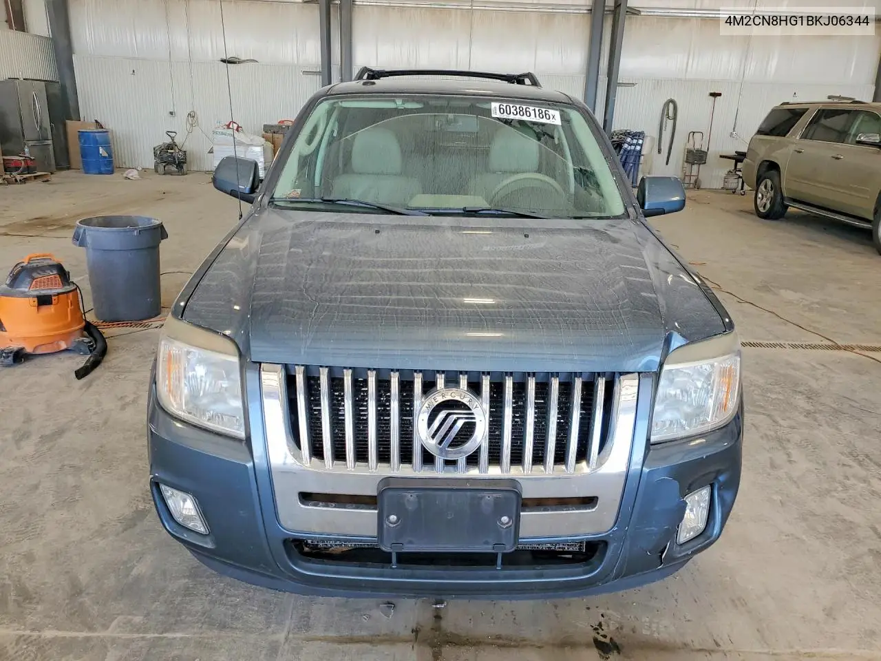 2011 Mercury Mariner Premier VIN: 4M2CN8HG1BKJ06344 Lot: 60386186