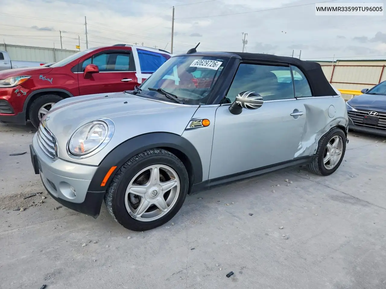 2009 Mini Cooper VIN: WMWMR33599TU96005 Lot: 60629726