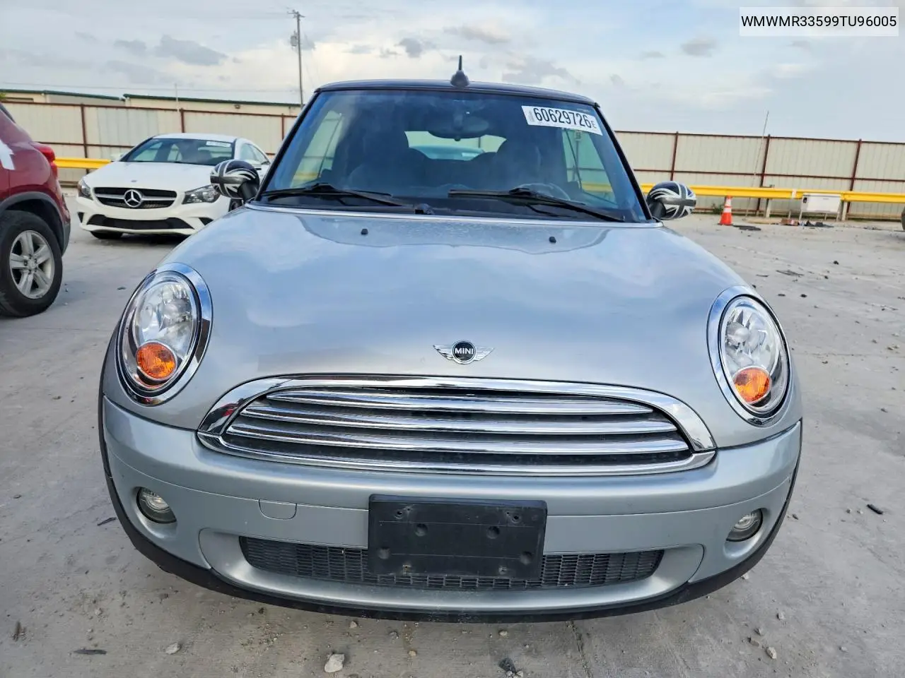 2009 Mini Cooper VIN: WMWMR33599TU96005 Lot: 60629726