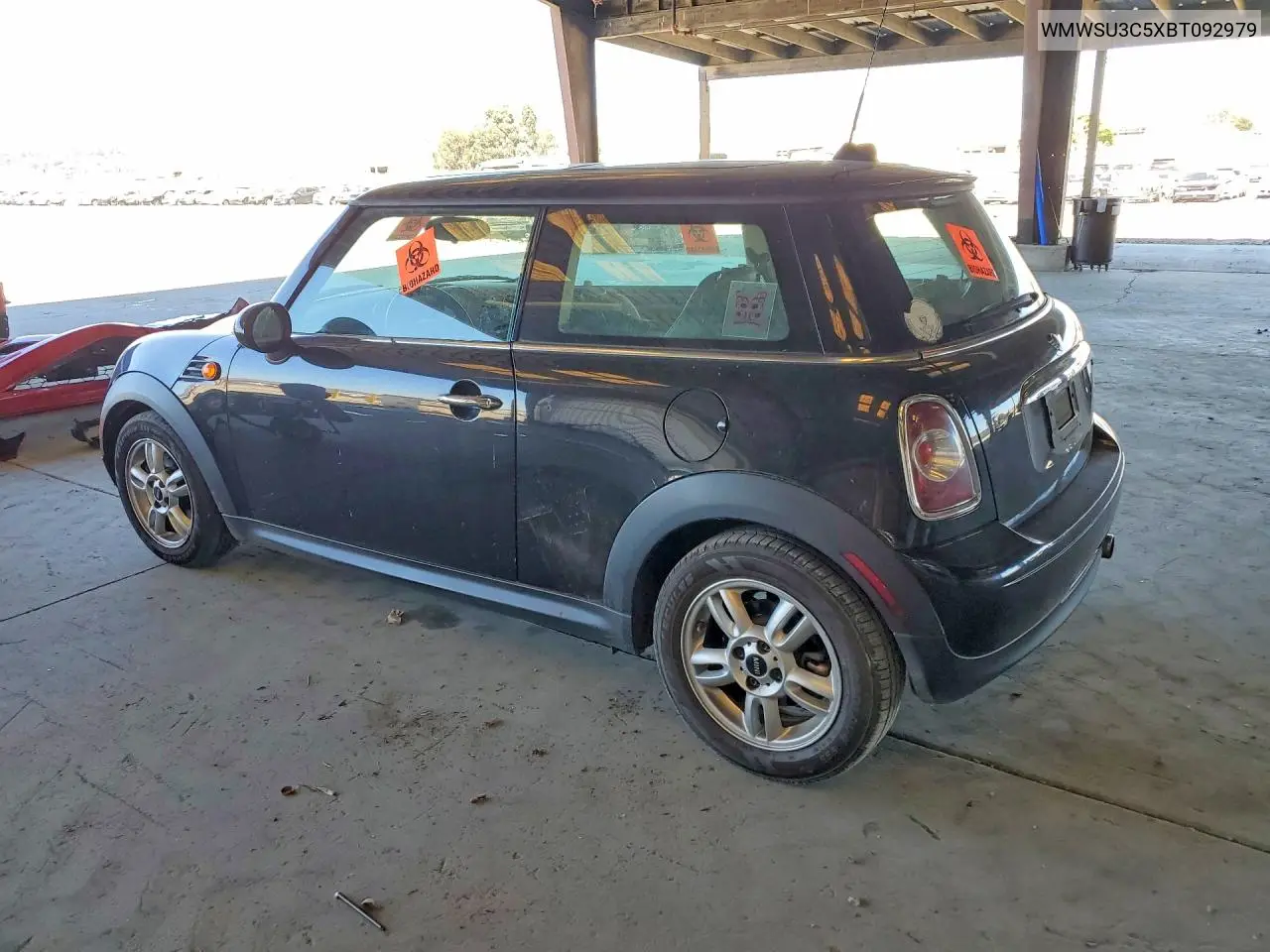 2011 Mini Cooper VIN: WMWSU3C5XBT092979 Lot: 62130146