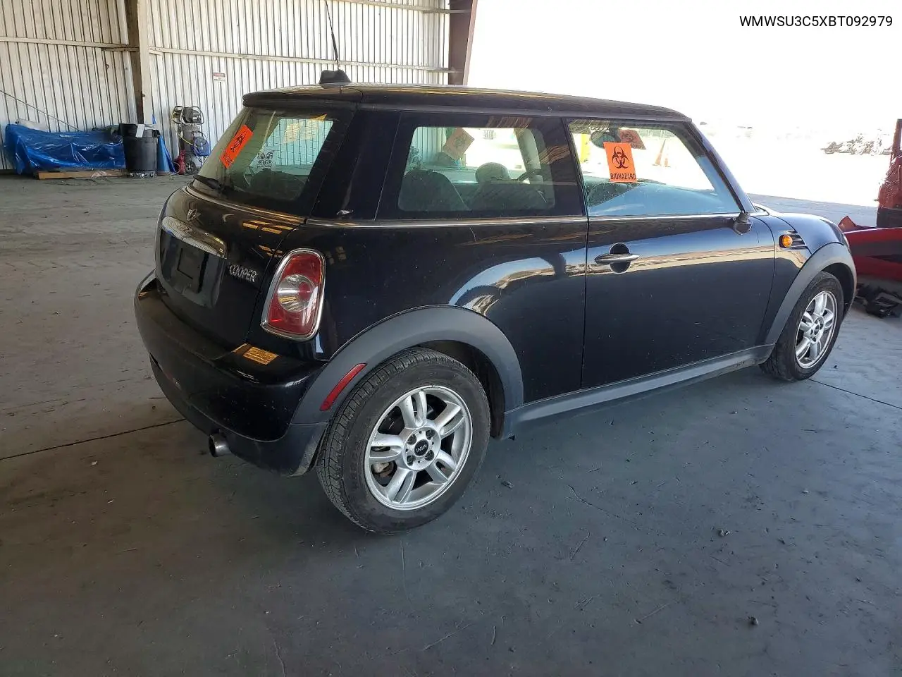 2011 Mini Cooper VIN: WMWSU3C5XBT092979 Lot: 62130146