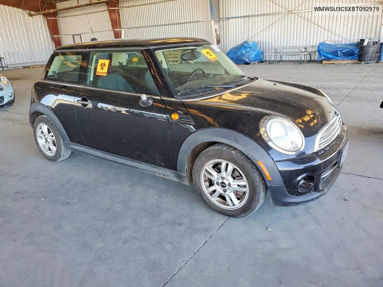 2011 Mini Cooper VIN: WMWSU3C5XBT092979 Lot: 62130146