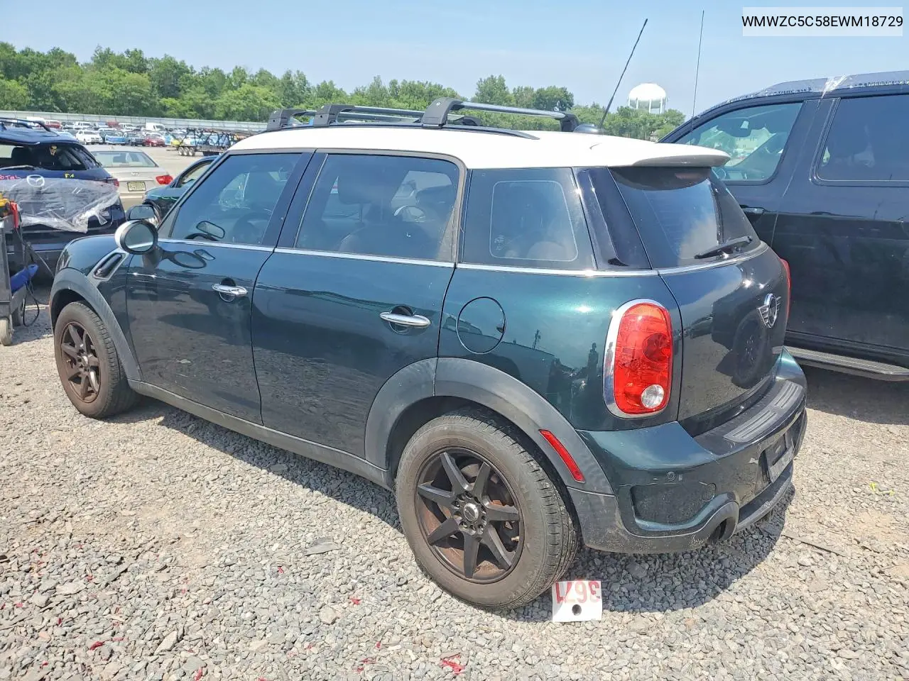2014 Mini Cooper S Countryman VIN: WMWZC5C58EWM18729 Lot: 61037726