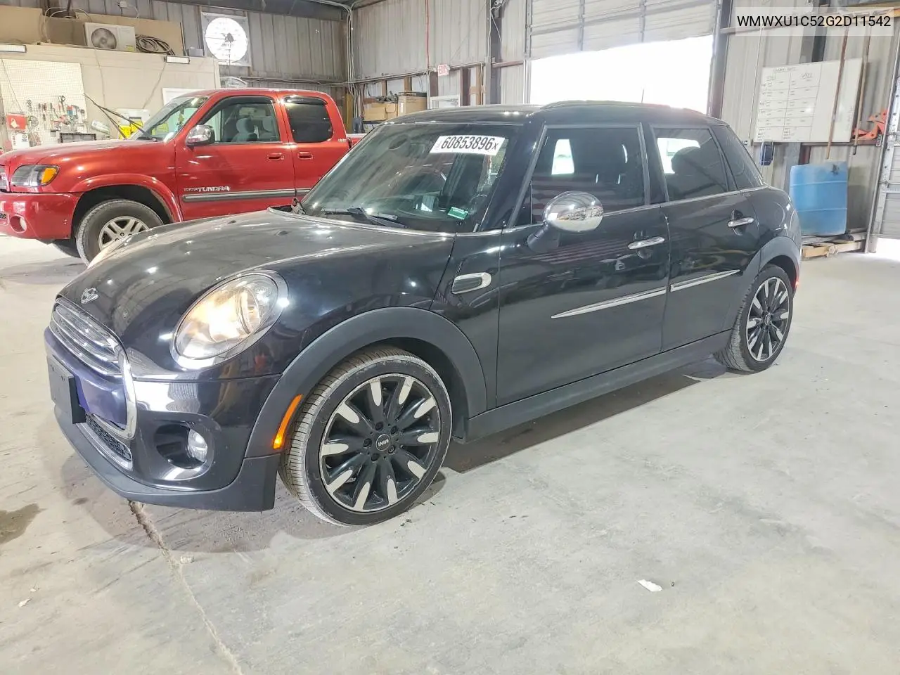 2016 Mini Cooper VIN: WMWXU1C52G2D11542 Lot: 60853896