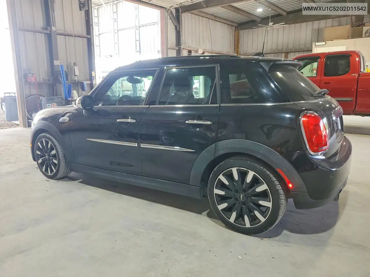 2016 Mini Cooper VIN: WMWXU1C52G2D11542 Lot: 60853896