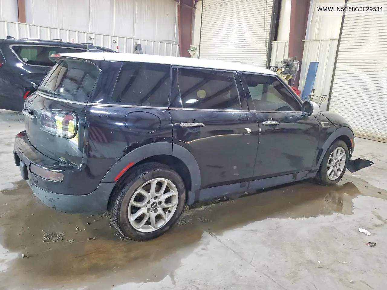 2016 Mini Cooper Clubman VIN: WMWLN5C58G2E29534 Lot: 61047316