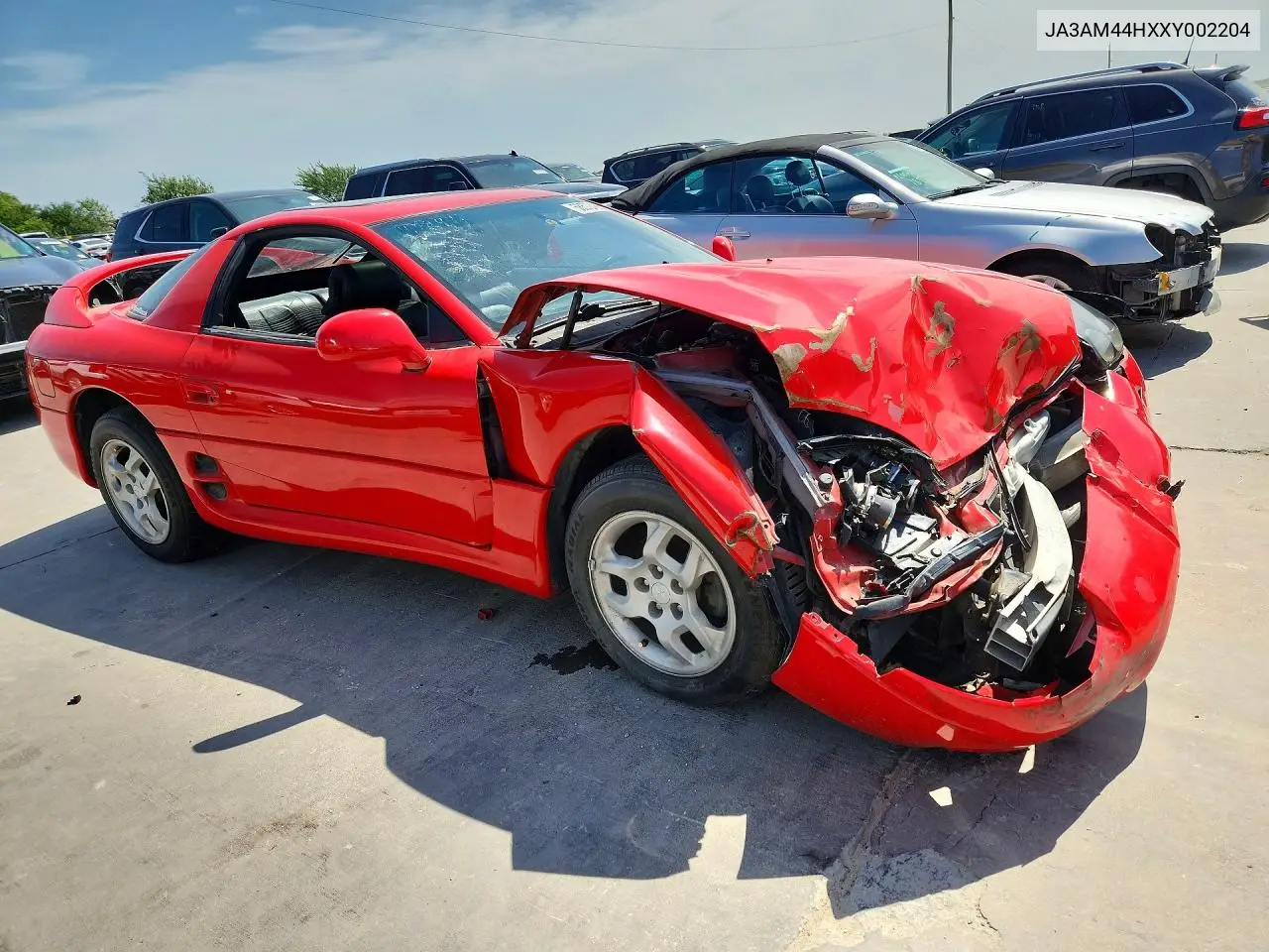 1999 Mitsubishi 3000 Gt VIN: JA3AM44HXXY002204 Lot: 58572466