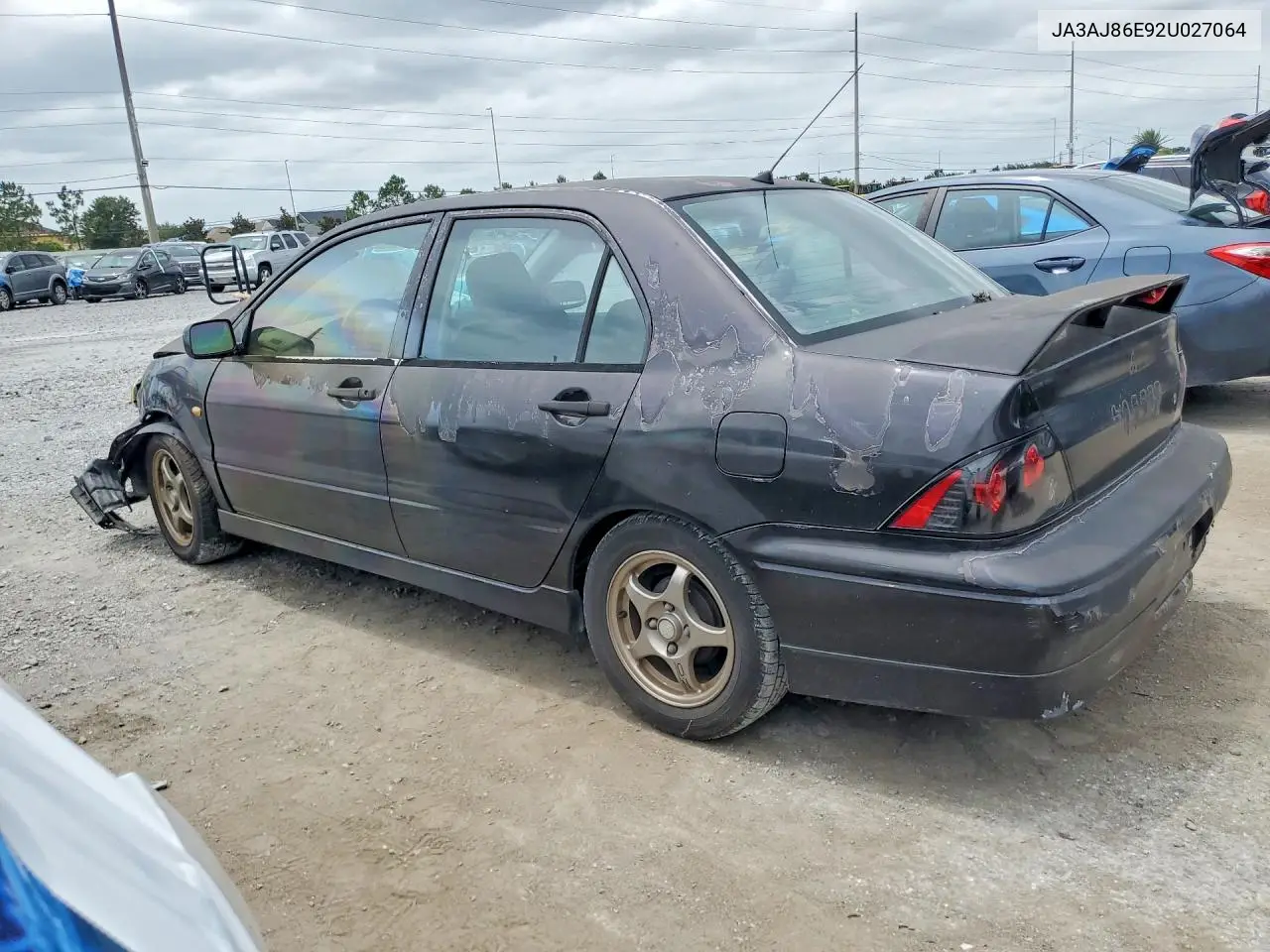 2002 Mitsubishi Lancer Oz Rally VIN: JA3AJ86E92U027064 Lot: 55208946