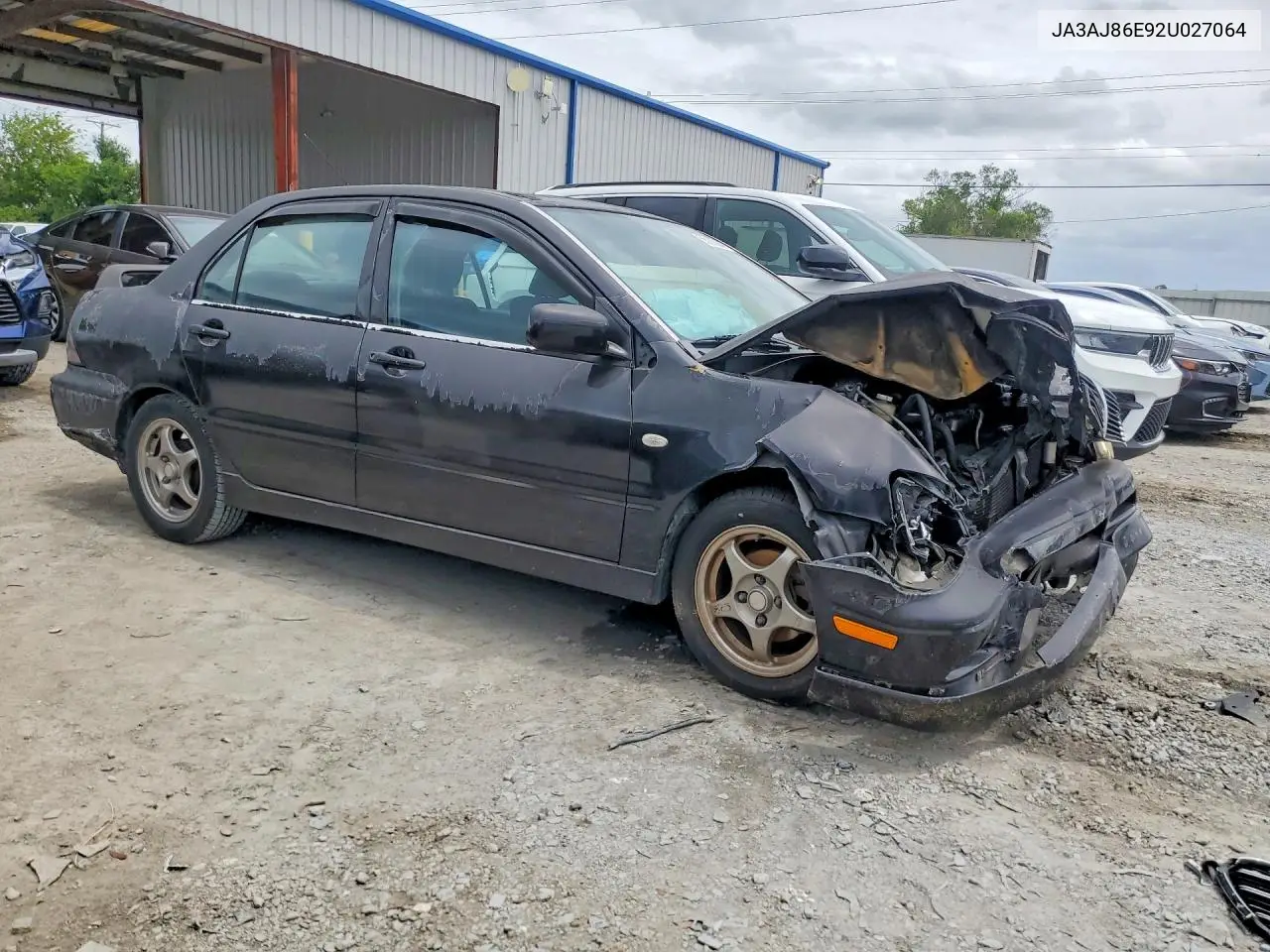 2002 Mitsubishi Lancer Oz Rally VIN: JA3AJ86E92U027064 Lot: 55208946