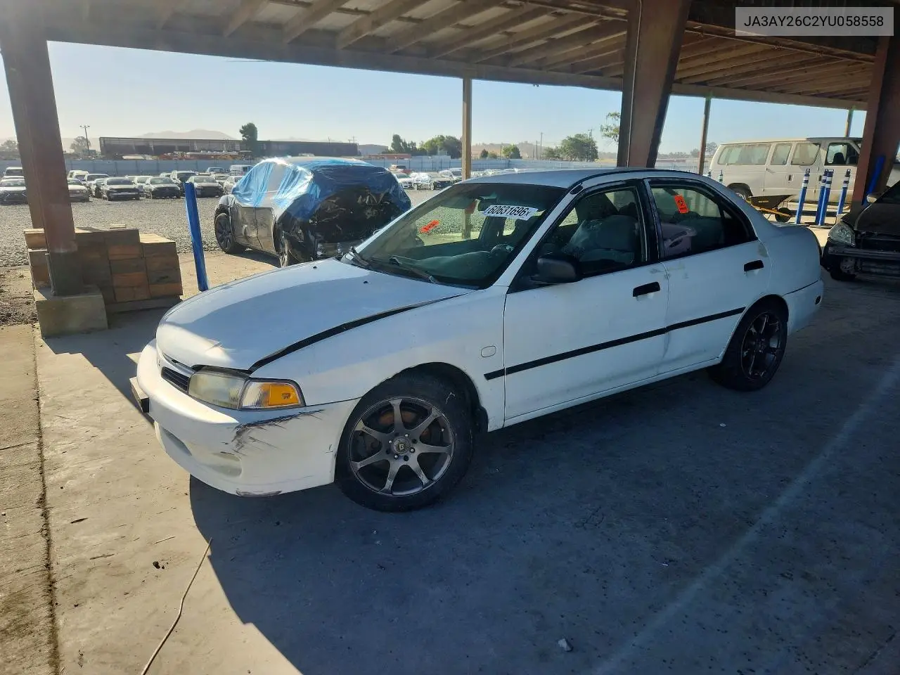 2000 Mitsubishi Mirage De VIN: JA3AY26C2YU058558 Lot: 60631696