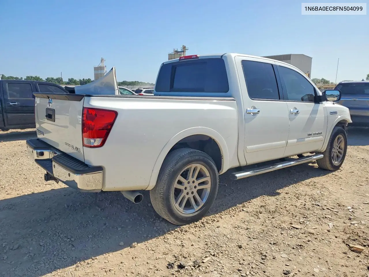 2015 Nissan Titan Sl VIN: 1N6BA0EC8FN504099 Lot: 61018526
