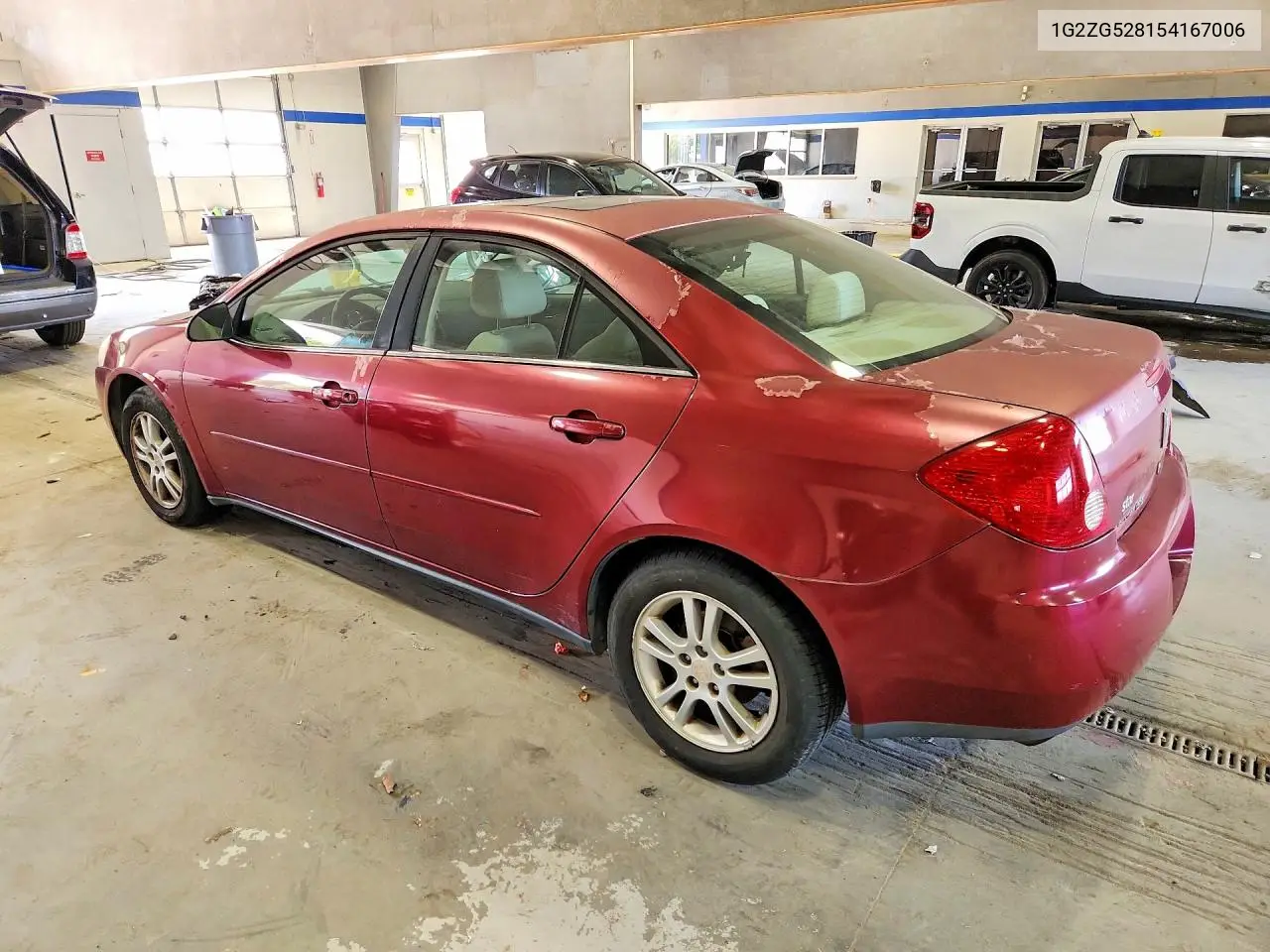2005 Pontiac G6 VIN: 1G2ZG528154167006 Lot: 53671756