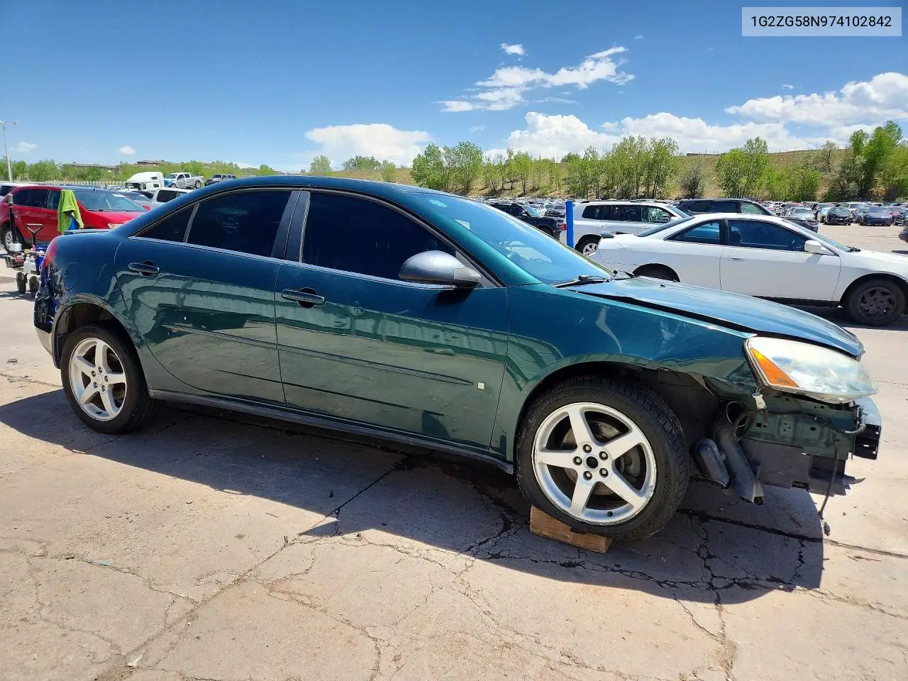 2007 Pontiac G6 Base VIN: 1G2ZG58N974102842 Lot: 53564136