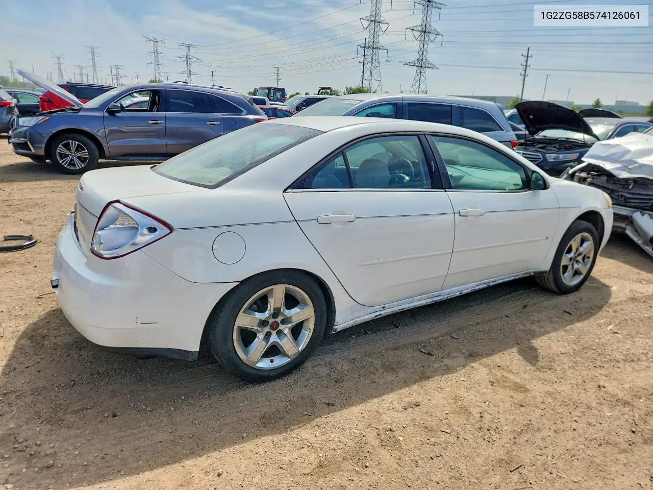 2007 Pontiac G6 Base VIN: 1G2ZG58B574126061 Lot: 54466256