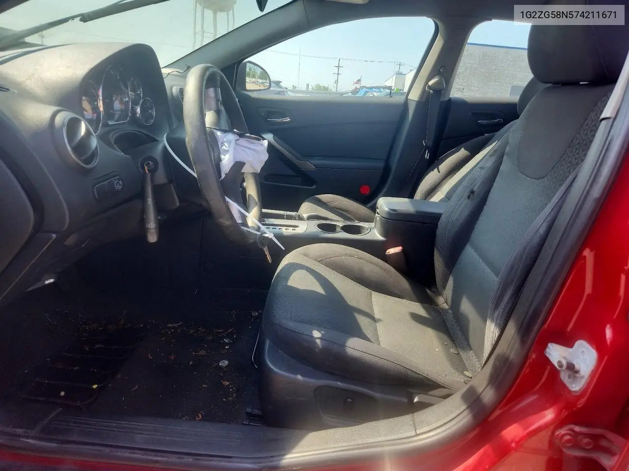 2007 Pontiac G6 Base VIN: 1G2ZG58N574211671 Lot: 61131176