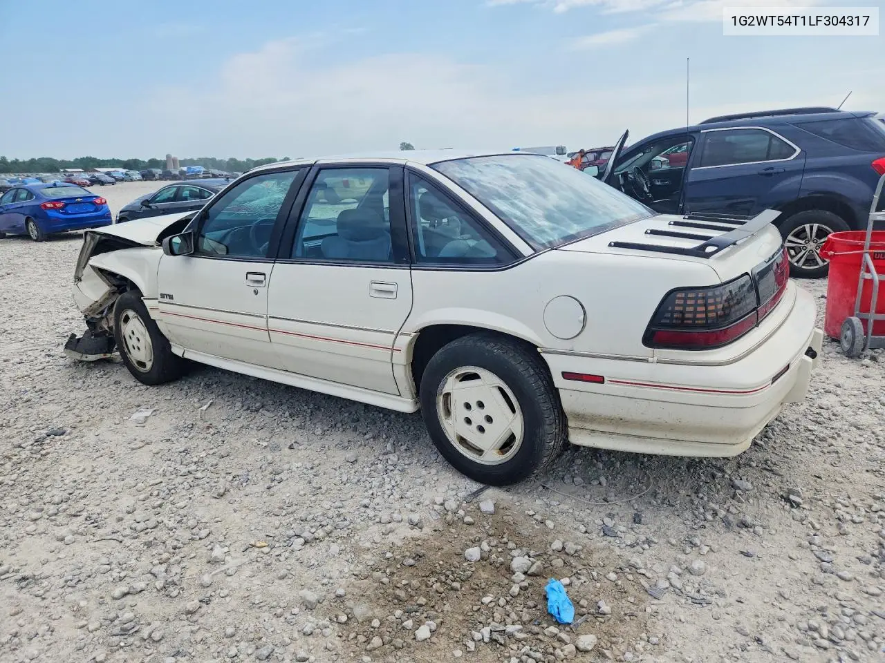 1990 Pontiac Grand Prix Ste VIN: 1G2WT54T1LF304317 Lot: 60313696