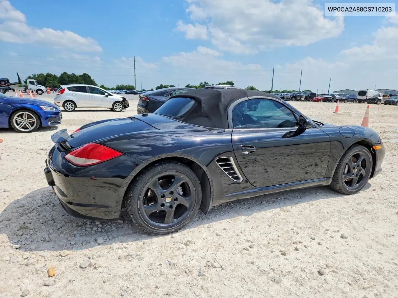 2012 Porsche Boxster VIN: WP0CA2A88CS710203 Lot: 57419876