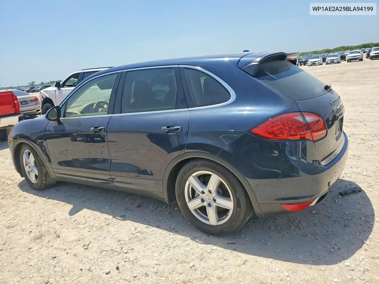 2011 Porsche Cayenne S Hybrid VIN: WP1AE2A29BLA94199 Lot: 61703146